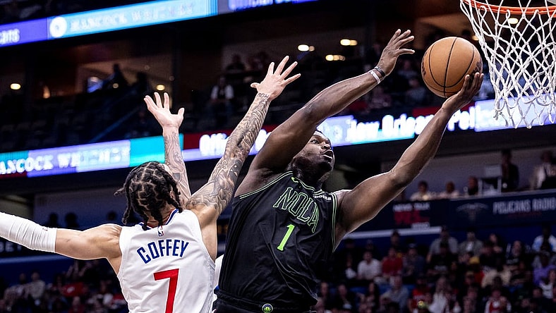 Mar 15, 2024; New Orleans, Louisiana, USA;  New Orleans Pelicans forward Zion Williamson (1) drives to the basket against LA Clippers guard Amir Coffey (7) during the first half at Smoothie King Center. Mandatory Credit: Stephen Lew-USA TODAY Sports