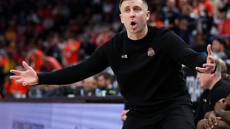 Mar 15, 2024; Minneapolis, MN, USA; Ohio State Buckeyes head coach Jake Diebler reacts to a call on the court during the second half against the Illinois Fighting Illini at Target Center. Mandatory Credit: Matt Krohn-USA TODAY Sports
