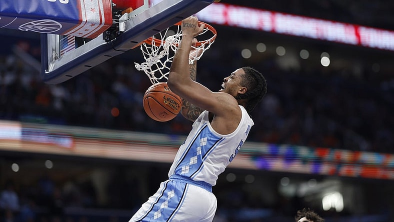 Mar 15, 2024; Washington, D.C., USA; North Carolina Tar Heels forward Armando Bacot (5) dunks the ball against the Pittsburgh Panthers in the second half at Capital One Arena. Mandatory Credit: Geoff Burke-USA TODAY Sports