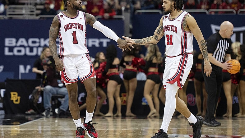Mar 15, 2024; Kansas City, MO, USA; Houston Cougars guard Jamal Shead (1) celebrates with guard Emanuel Sharp (21) in the second half against the Texas Tech Red Raiders at T-Mobile Center. Mandatory Credit: Amy Kontras-USA TODAY Sports