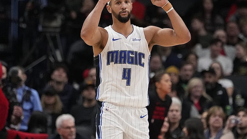 Mar 15, 2024; Toronto, Ontario, CAN; Orlando Magic guard Jalen Suggs (4) celebrates a play against the Toronto Raptors during the second half at Scotiabank Arena. Mandatory Credit: John E. Sokolowski-USA TODAY Sports