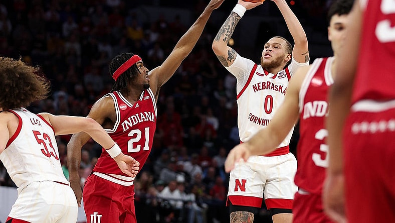 Mar 15, 2024; Minneapolis, MN, USA; Nebraska Cornhuskers guard C.J. Wilcher (0) shoots as Indiana Hoosiers forward Mackenzie Mgbako (21) defends during the first half at Target Center. Mandatory Credit: Matt Krohn-USA TODAY Sports