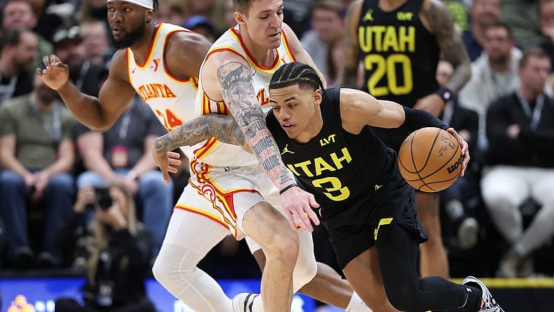 Mar 15, 2024; Salt Lake City, Utah, USA; Utah Jazz guard Keyonte George (3) drives against Atlanta Hawks guard Vit Krejci (27) during the second quarter at Delta Center. Mandatory Credit: Rob Gray-USA TODAY Sports