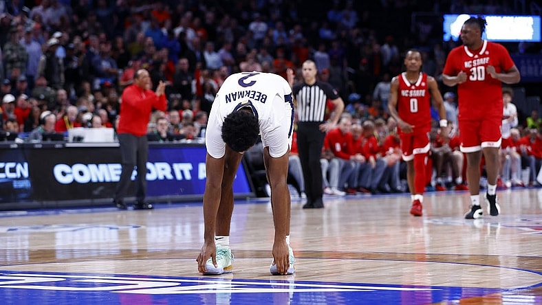 Mar 15, 2024; Washington, D.C., USA; Virginia Cavaliers guard Reece Beekman (2) reacts after missing two free throws in the second half against the North Carolina State Wolfpack at Capital One Arena. Mandatory Credit: Amber Searls-USA TODAY Sports