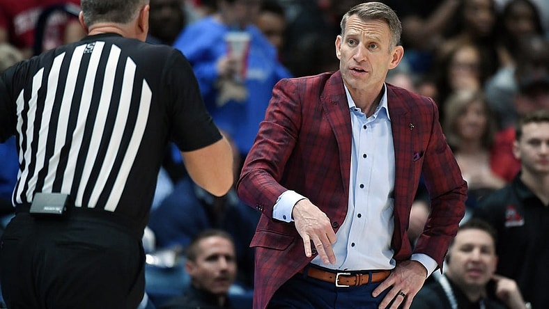 Mar 15, 2024; Nashville, TN, USA; Alabama Crimson Tide head coach Nate Oats questions a call by the officials during the second half against the Florida Gators at Bridgestone Arena. Mandatory Credit: Christopher Hanewinckel-USA TODAY Sports