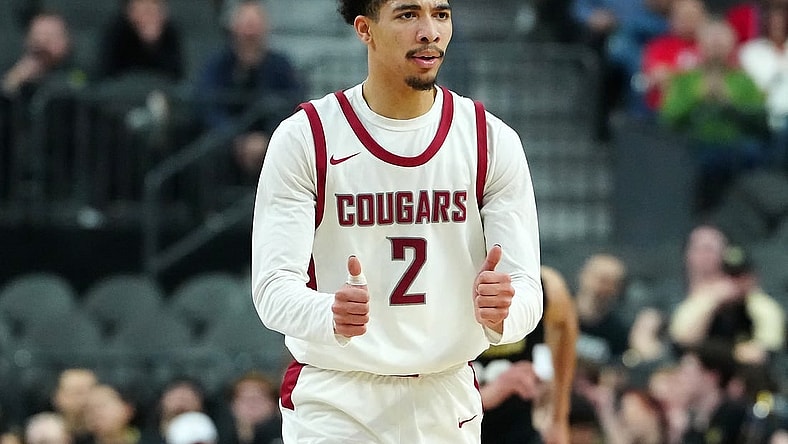 Mar 15, 2024; Las Vegas, NV, USA; Washington State Cougars guard Myles Rice (2) gestures after scoring against the Colorado Buffaloes during the first half at T-Mobile Arena. Mandatory Credit: Stephen R. Sylvanie-USA TODAY Sports