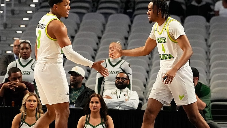 Mar 16, 2024; Fort Worth, TX, USA;  South Florida Bulls guard Kobe Knox (4) celebrates with South Florida Bulls guard Chris Youngblood (3) after scoring a three point basket against the UAB Blazers during the first half at Dickies Arena. Mandatory Credit: Chris Jones-USA TODAY Sports