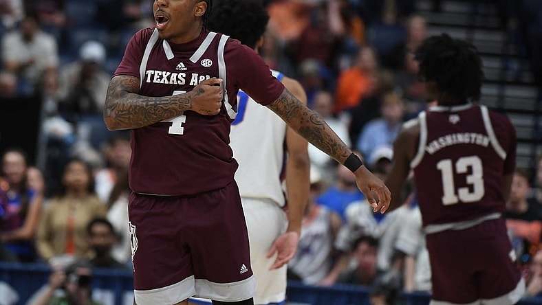 Mar 16, 2024; Nashville, TN, USA; Texas A&M Aggies guard Wade Taylor IV (4) celebrates after a basket during the first half against the Florida Gators at Bridgestone Arena. Mandatory Credit: Christopher Hanewinckel-USA TODAY Sports