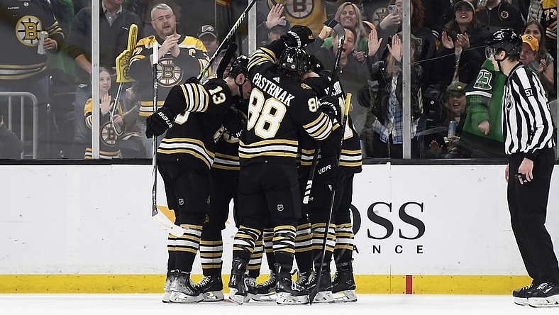 Mar 16, 2024; Boston, Massachusetts, USA; Boston Bruins center Charlie Coyle (13) celebrates his goal with his teammates during the second period against the Philadelphia Flyers at TD Garden. Mandatory Credit: Bob DeChiara-USA TODAY Sports