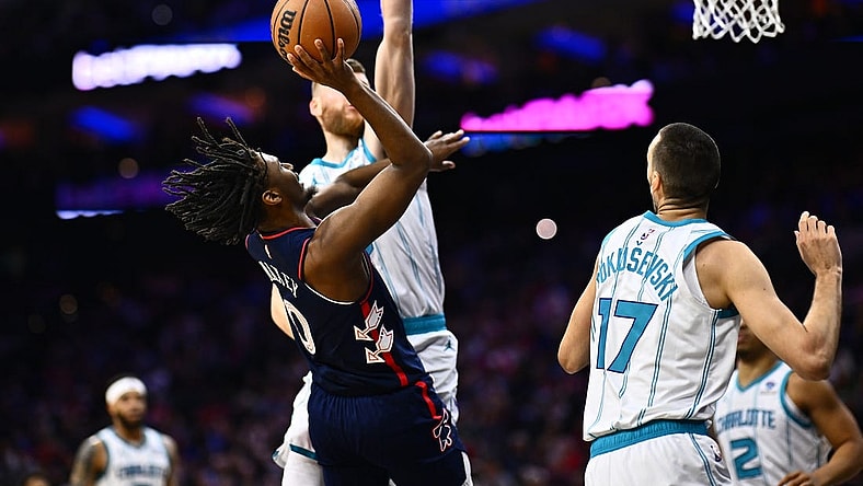 Mar 16, 2024; Philadelphia, Pennsylvania, USA; Philadelphia 76ers guard Tyrese Maxey (0) shoots against Charlotte Hornets forward Davis Bertans (9) in the second quarter at Wells Fargo Center. Mandatory Credit: Kyle Ross-USA TODAY Sports