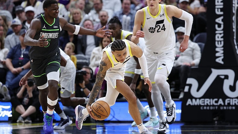 Mar 16, 2024; Salt Lake City, Utah, USA; Utah Jazz guard Keyonte George (3) picks up a loose ball against the Minnesota Timberwolves during the second quarter at Delta Center. Mandatory Credit: Rob Gray-USA TODAY Sports