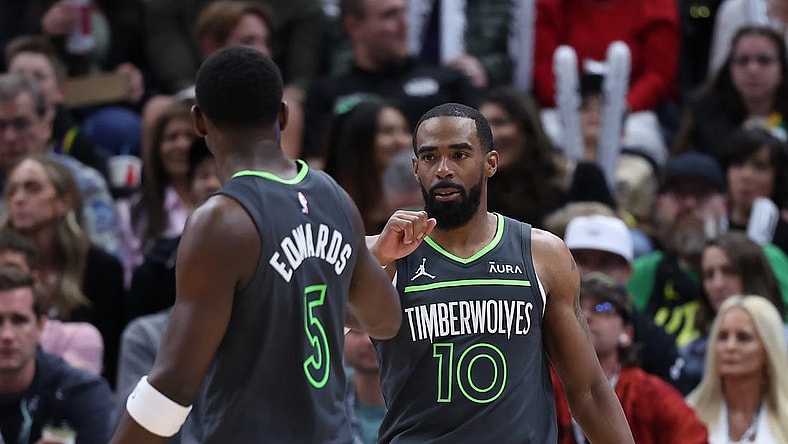 Mar 16, 2024; Salt Lake City, Utah, USA; Minnesota Timberwolves guard Mike Conley (10) reacts to a play against the Utah Jazz with guard Anthony Edwards (5) during the second quarter at Delta Center. Mandatory Credit: Rob Gray-USA TODAY Sports