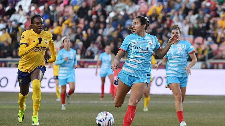 Mar 16, 2024; Sandy, Utah, USA;  Chicago Red Stars defender Sam Staab (3) controls the ball against Utah Royals FC forward Ify Onumonu (11) in the second half at America First Field. Mandatory Credit: Isaac Hale-USA TODAY Sports