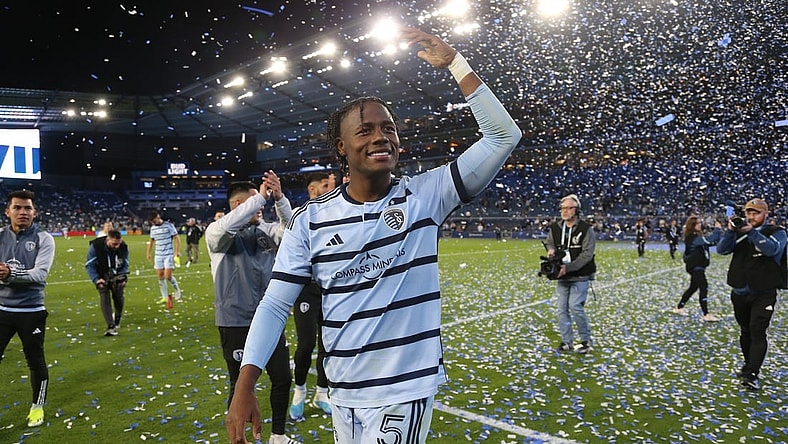 Mar 16, 2024; Kansas City, Kansas, USA; Sporting Kansas City defender Dany Rosero (5) celebrates with fans after defeating the San Jose Earthquakes at Children's Mercy Park. Mandatory Credit: Scott Sewell-USA TODAY Sports