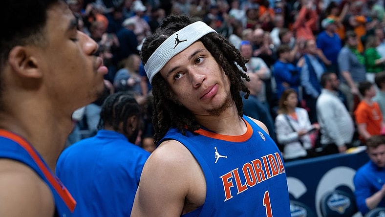 Florida Gators guard Walter Clayton Jr. (1) consoles teammate guard Zyon Pullin (0) after losing to Auburn in the SEC Men's Basketball Tournament Championship game at Bridgestone Arena in Nashville, Tenn., Sunday, March 17, 2024 at Bridgestone Arena in Nashville, Tenn., Sunday, March 17, 2024.