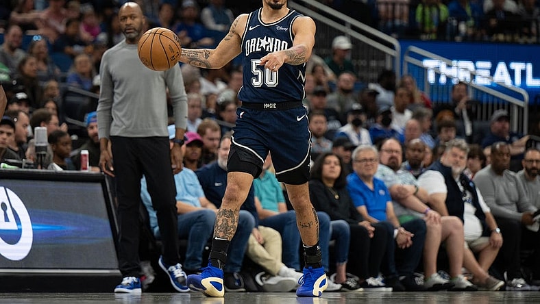 Mar 17, 2024; Orlando, Florida, USA; Orlando Magic guard Cole Anthony (50) dribbles the ball against the Toronto Raptors in the second quarter  at KIA Center. Mandatory Credit: Jeremy Reper-USA TODAY Sports