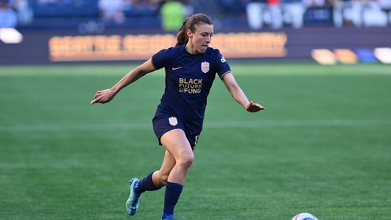 Mar 17, 2024; Seattle, Washington, USA; Seattle Reign defender Sofia Huerta  (11) moves the ball against the Washington Spirit during the second half at Lumen Field. Mandatory Credit: Steven Bisig-USA TODAY Sports