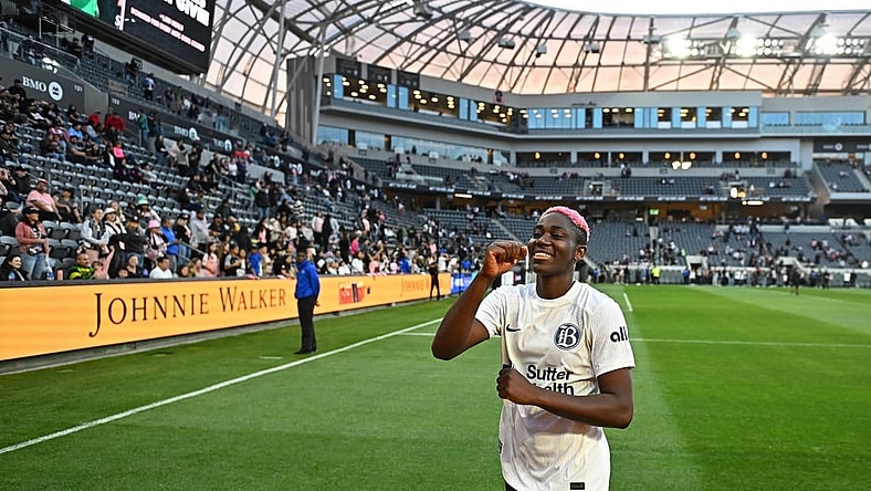 Mar 17, 2024; Los Angeles, California, USA; Bay FC forward Asisat Oshoala (8) celebrates the win over the Angel City FC at BMO Stadium. Mandatory Credit: Kelvin Kuo-USA TODAY Sports