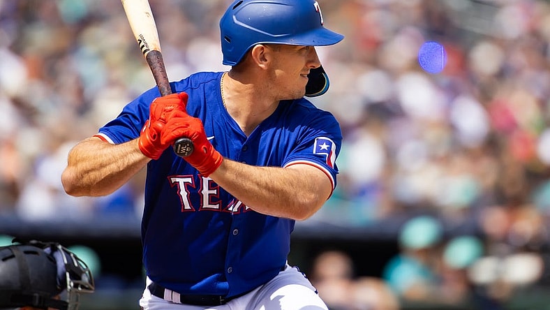 Mar 18, 2024; Surprise, Arizona, USA; Texas Rangers outfielder Wyatt Langford against the Seattle Mariners during a spring training baseball game at Surprise Stadium. Mandatory Credit: Mark J. Rebilas-USA TODAY Sports