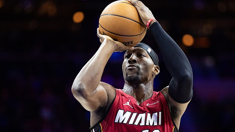 Mar 18, 2024; Philadelphia, Pennsylvania, USA; Miami Heat center Bam Adebayo (13) shoots a foul shot against the Philadelphia 76ers during the third quarter at Wells Fargo Center. Mandatory Credit: Bill Streicher-USA TODAY Sports