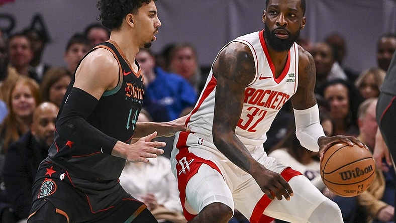 Mar 19, 2024; Washington, District of Columbia, USA; Houston Rockets forward Jeff Green (32) dribbles a sWashington Wizards guard Jules Bernard (14) defends during the first half  at Capital One Arena. Mandatory Credit: Tommy Gilligan-USA TODAY Sports