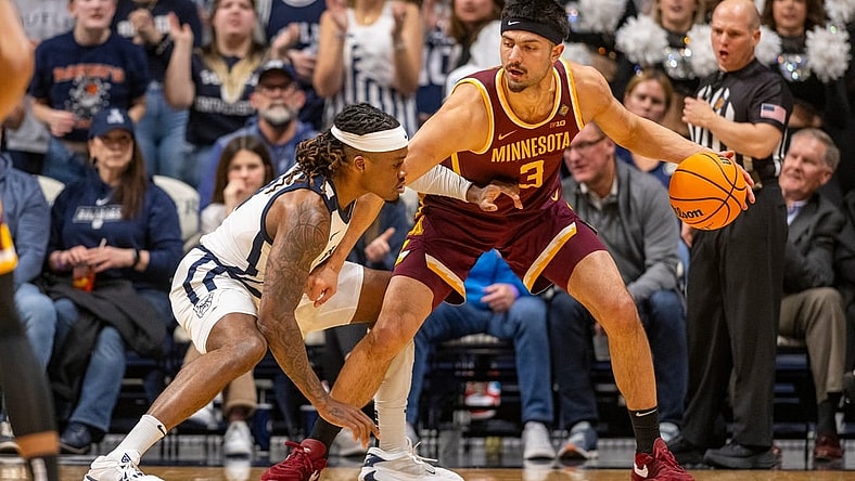 Butler Bulldogs guard Posh Alexander, left, defends Minnesota Golden Gophers forward Dawson Garcia (3) during the first half of an NCAA/NIT game, Tuesday, March 19, 2024, at Hinkle Fieldhouse on the campus of Butler University in Indianapolis.