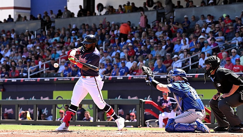 Mar 20, 2024; North Port, Florida, USA; Atlanta Braves center fielder Michael Harris III (23) gets on base with a fielders choice in the second inning of a spring training game against the Toronto Blue Jays  at CoolToday Park. Mandatory Credit: Jonathan Dyer-USA TODAY Sports