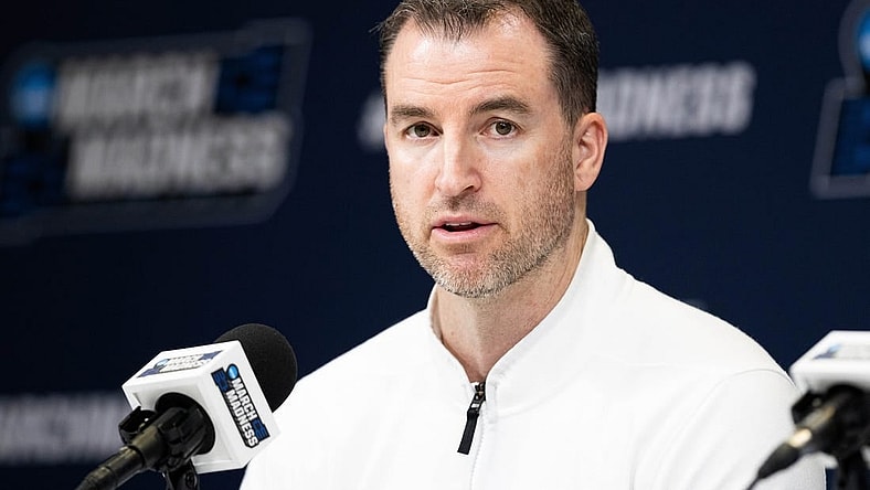 Mar 21, 2024; Indianapolis, IN, USA; Utah State Aggies head coach Danny Sprinkle talks to the media during the practice day at Gainbridge FieldHouse. Mandatory Credit: Trevor Ruszkowski-USA TODAY Sports