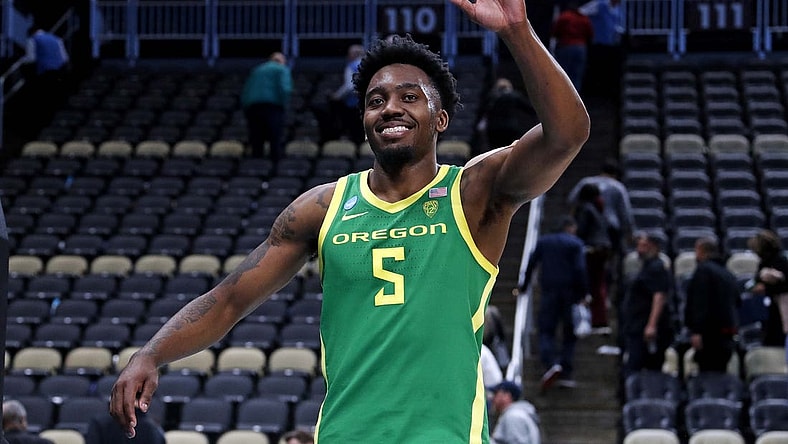 Mar 21, 2024; Pittsburgh, PA, USA; Oregon Ducks guard Jermaine Couisnard (5) waves as he walks off the court after the Oregon Ducks beat the South Carolina Gamecocks in the first round of the 2024 NCAA Tournament at PPG Paints Arena. Mandatory Credit: Charles LeClaire-USA TODAY Sports