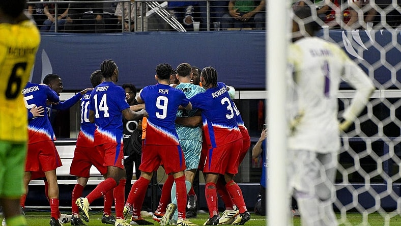 Mar 21, 2024; Arlington, Texas, USA; The United States team celebrates scoring the game tying goal against Jamaica goalkeeper Andre Blake (1) during the second half at AT&T Stadium. Mandatory Credit: Jerome Miron-USA TODAY Sports