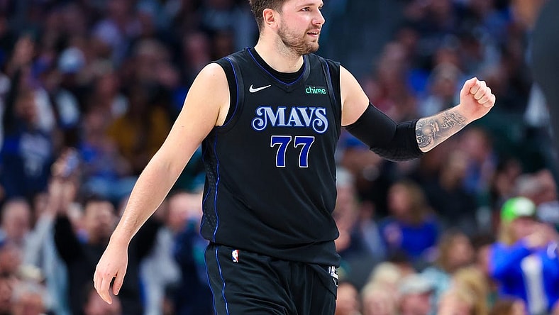 Mar 21, 2024; Dallas, Texas, USA;  Dallas Mavericks guard Luka Doncic (77) reacts during the first half against the Utah Jazz at American Airlines Center. Mandatory Credit: Kevin Jairaj-USA TODAY Sports