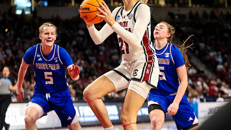 Mar 22, 2024; Columbia, SC, USA; South Carolina Gamecocks forward Chloe Kitts (21) drives against the Presbyterian Blue Hose in the first half at Colonial Life Arena. Mandatory Credit: Jeff Blake-USA TODAY Sports