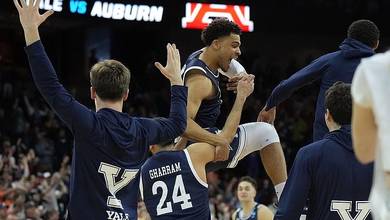 Mar 22, 2024; Spokane, WA, USA; Yale Bulldogs forward Matt Knowling (22) celebrates with guard Yassine Gharram (24) after a game against the Auburn Tigers in the first round of the 2024 NCAA Tournament at Spokane Veterans Memorial Arena. Mandatory Credit: Kirby Lee-USA TODAY Sports