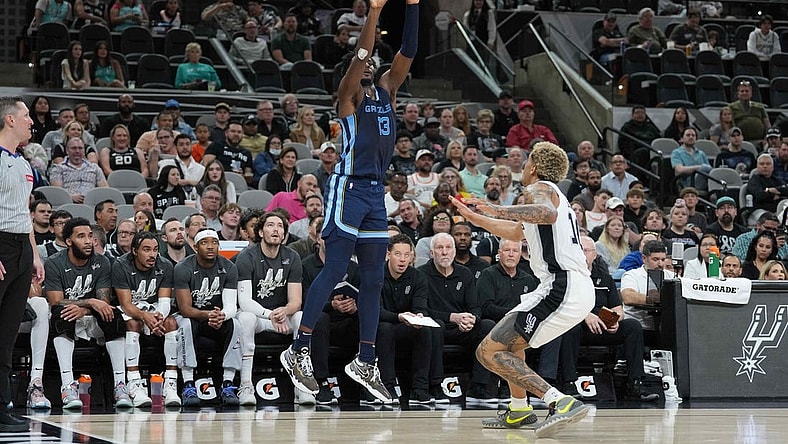 Mar 22, 2024; San Antonio, Texas, USA; Memphis Grizzlies forward Jaren Jackson Jr. (13) shoots over San Antonio Spurs forward Jeremy Sochan (10) in the first half at Frost Bank Center. Mandatory Credit: Daniel Dunn-USA TODAY Sports