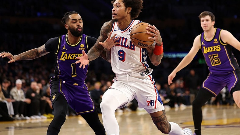 Mar 22, 2024; Los Angeles, California, USA;  Philadelphia 76ers guard Kelly Oubre Jr. (9) drives to the basket against Los Angeles Lakers guard D'Angelo Russell (1) during the first quarter at Crypto.com Arena. Mandatory Credit: Kiyoshi Mio-USA TODAY Sports