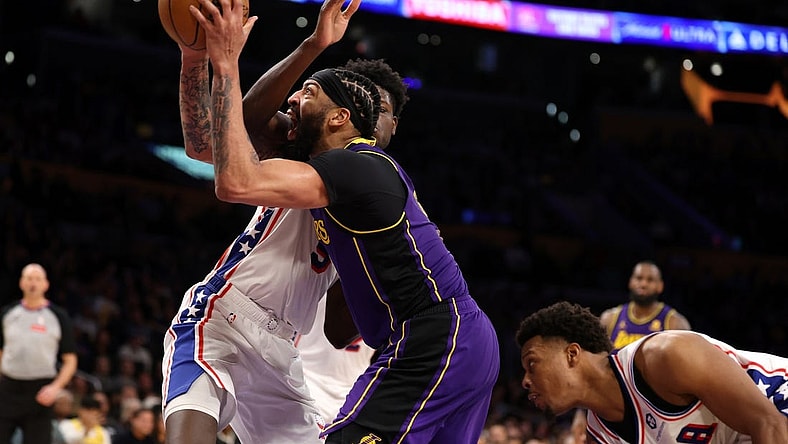 Mar 22, 2024; Los Angeles, California, USA;  Los Angeles Lakers forward Anthony Davis (3) goes to the basket against Philadelphia 76ers center Mo Bamba (5) during the fourth quarter at Crypto.com Arena. Mandatory Credit: Kiyoshi Mio-USA TODAY Sports