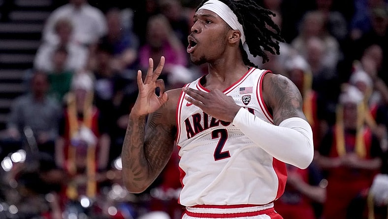 Mar 23, 2024; Salt Lake City, UT, USA; Arizona Wildcats guard Caleb Love (2) reacts after a basket during the first half in the second round of the 2024 NCAA Tournament against the Dayton Flyers at Vivint Smart Home Arena-Delta Center. Mandatory Credit: Gabriel Mayberry-USA TODAY Sports