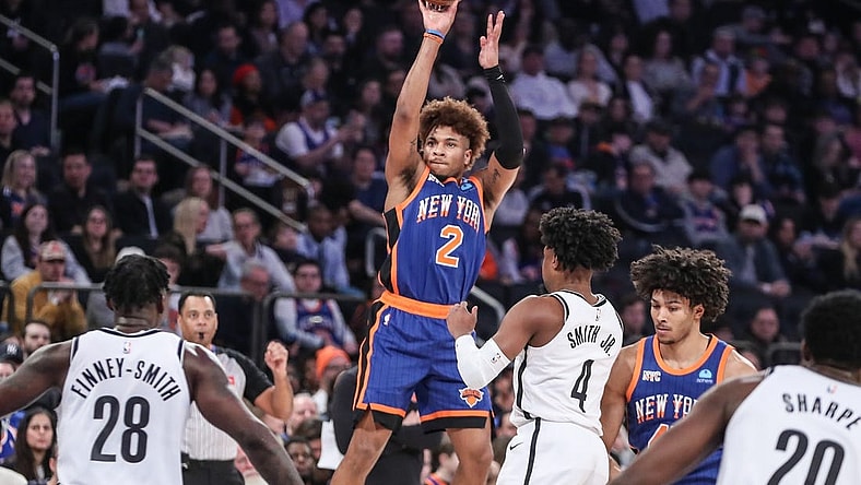 Mar 23, 2024; New York, New York, USA;  New York Knicks guard Miles McBride (2) takes a three point shot in the first quarter against the Brooklyn Nets at Madison Square Garden. Mandatory Credit: Wendell Cruz-USA TODAY Sports