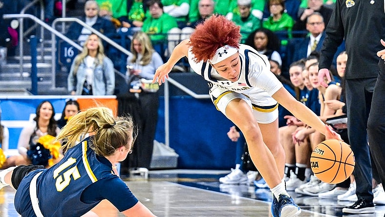 Mar 23, 2024; South Bend, Indiana, USA; Notre Dame Fighting Irish guard Hannah Hidalgo (3) steals the ball from Kent State Golden Flashes forward Bridget Dunn (15) in the second half at the Purcell Pavilion. Mandatory Credit: Matt Cashore-USA TODAY Sports