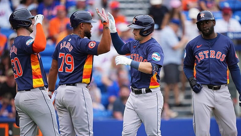 Mar 23, 2024; Port St. Lucie, Florida, USA;  Houston Astros third baseman Alex Bregman, center, is congratulated by first baseman Jose Abreu (79), right fielder Kyle Tucker (30) and designated hitter Yordan Alvarez, right, after hitting a three-run home run in the first inning against the New York Mets at Clover Park. Mandatory Credit: Jim Rassol-USA TODAY Sports