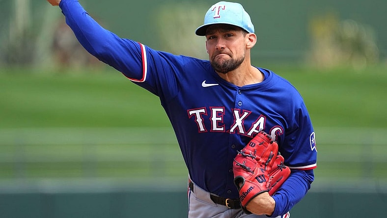 Mar 23, 2024; Surprise, Arizona, USA; Texas Rangers starting pitcher Nathan Eovaldi (17) pitches against the Kansas City Royals during the second inning at Surprise Stadium. Mandatory Credit: Joe Camporeale-USA TODAY Sports