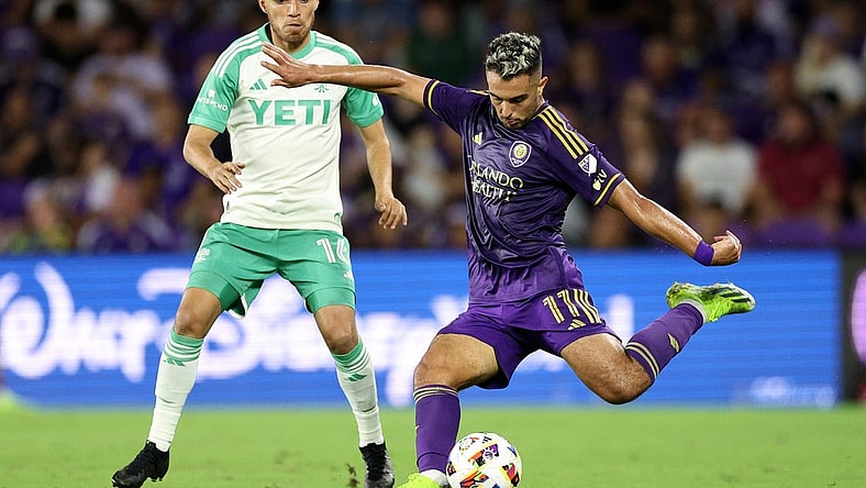 Mar 23, 2024; Orlando, Florida, USA; Orlando City midfielder Martin Ojeda (11) controls the ball against Austin FC defender Hector Jimenez (16) in the second half at Inter&Co Stadium. Mandatory Credit: Nathan Ray Seebeck-USA TODAY Sports