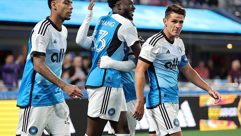 Mar 23, 2024; Charlotte, North Carolina, USA; Charlotte FC forward Patrick Agyemang (33) reacts after scoring a goal against the Columbus Crew in the second half at Bank of America Stadium. Mandatory Credit: Cory Knowlton-USA TODAY Sports