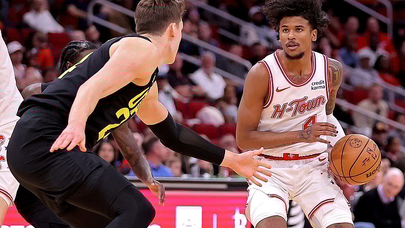 Mar 23, 2024; Houston, Texas, USA; Houston Rockets guard Jalen Green (4) handles the ball against Utah Jazz center Walker Kessler (24) during the third quarter at Toyota Center. Mandatory Credit: Erik Williams-USA TODAY Sports