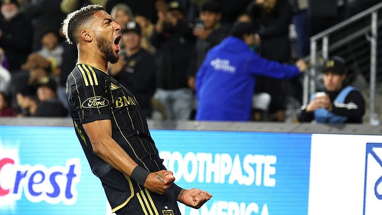 Mar 23, 2024; Los Angeles, California, USA; LAFC forward Denis Bouanga (99) celebrates his goal against Nashville SC during the first half at BMO Stadium. Mandatory Credit: Kiyoshi Mio-USA TODAY Sports