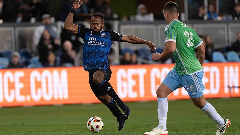 Mar 24, 2024; San Jose, California, USA; San Jose Earthquakes forward Jeremy Ebobisse (11) dribbles against Seattle Sounders FC defender Jackson Ragen (25) during the second half at PayPal Park. Mandatory Credit: Stan Szeto-USA TODAY Sports