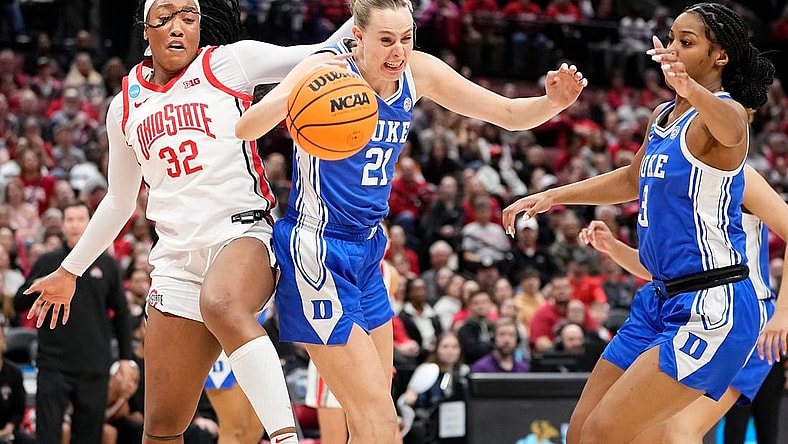 Mar 24, 2024; Columbus, OH, USA; Ohio State Buckeyes forward Cotie McMahon (32) fights for a rebound with Duke Blue Devils forward Camilla Emsbo (21) during the second half of the women’s NCAA Tournament second round at Value City Arena. Ohio State lost 75-63.