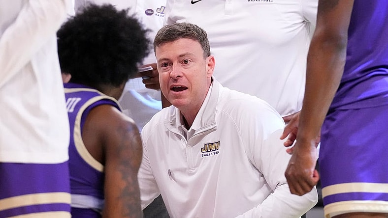 Mar 24, 2024; Brooklyn, NY, USA; James Madison Dukes head coach Mark Byington talks to the team during a time out against the Duke Blue Devils in the second round of the 2024 NCAA Tournament  at Barclays Center. Mandatory Credit: Robert Deutsch-USA TODAY Sports