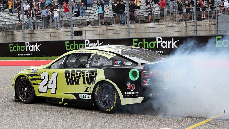 Mar 24, 2024; Austin, Texas, USA;  NASCAR Cup Series driver William Byron (24) performs a burn out after winning the EchoPark Automotive Grand Prix at Circuit of the Americas. Mandatory Credit: Michael C. Johnson-USA TODAY Sports