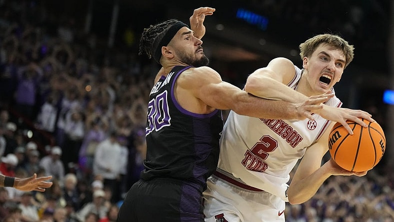 Mar 24, 2024; Spokane, WA, USA; Alabama Crimson Tide forward Grant Nelson (2) plays the ball defined by Grand Canyon Antelopes forward Gabe McGlothan (30) in the second half at Spokane Veterans Memorial Arena. Mandatory Credit: Kirby Lee-USA TODAY Sports